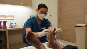 CGH podiatist removes dead and unhealthy tissue from wounds