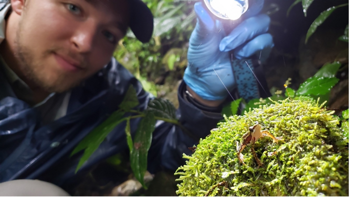 Kyle Janes with frog