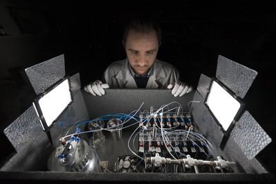 A New Method of Remote, Yet Rapid and Accurate Assessment of Oxygen Consumption by Microorganism