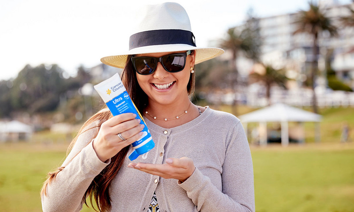 Woman wearing sunscreen