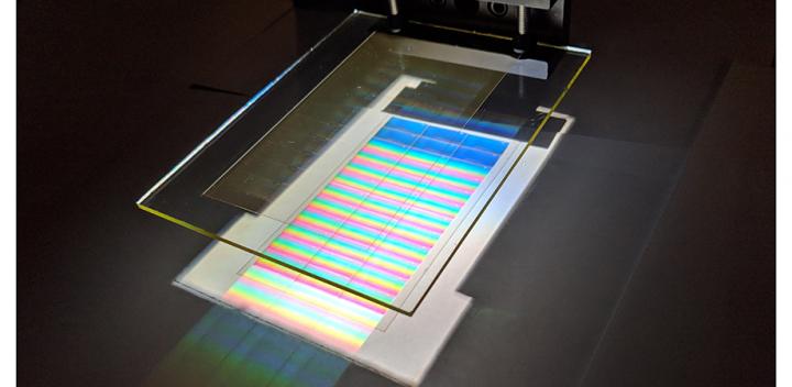 A holographic light collector separates the colors of sunlight and directs them to the solar cells