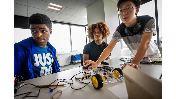 Student work on the trickiest part of the camp, coding and programming their vehicle