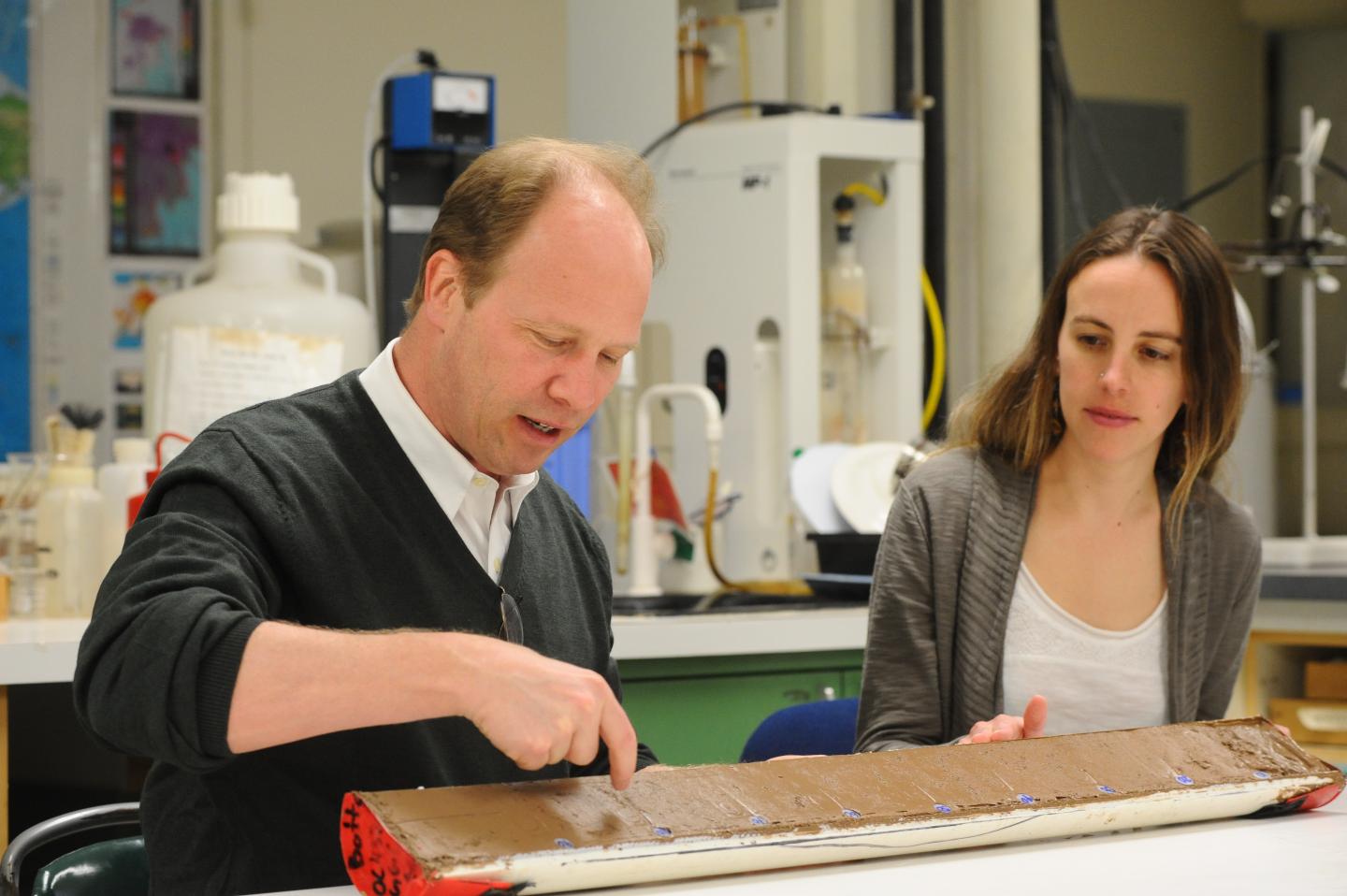 Researchers deMenocal and Tierney with Sediment Core