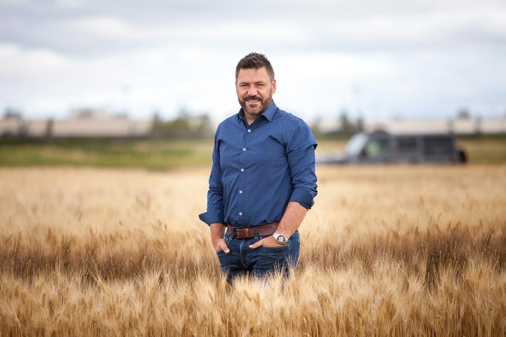 Curtis Pozniak in wheat field