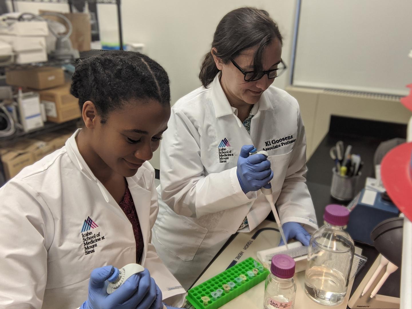 Scientists Processing Serum Samples