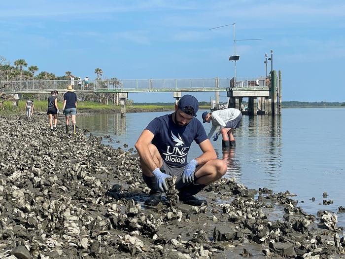 UNF students installing POSH units for coastal restoration