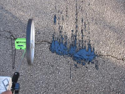 Crack Sealed by GTRI Prototype Automated Pavement Crack Detection and Sealing System