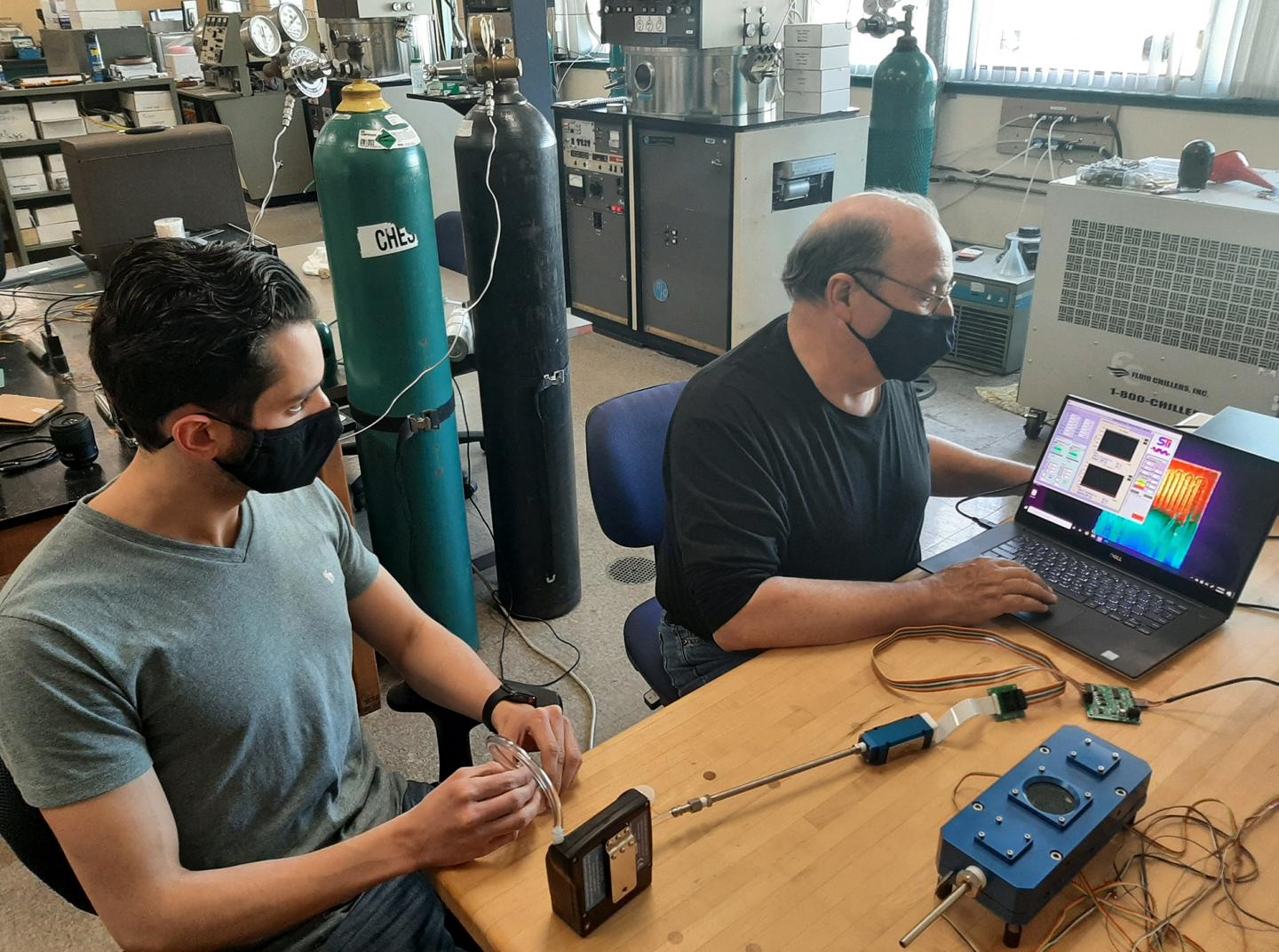 URI doctoral student Peter Ricci and Professor Otto Gregory