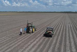 Conducting deep soil coring