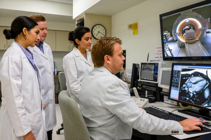 Michael Nelson, right, with colleagues