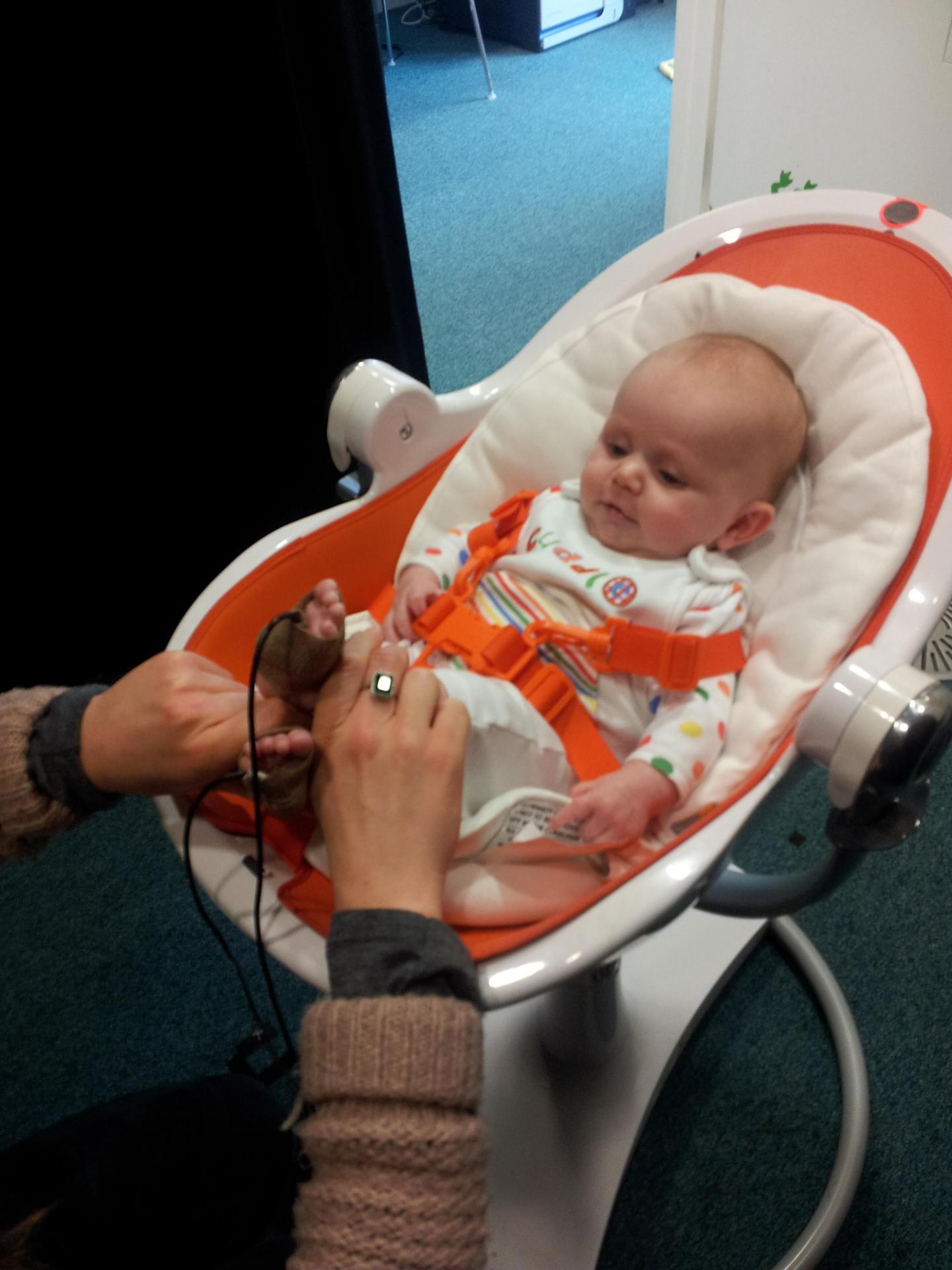 Infant Receiving Tactile Buzzes