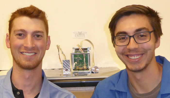 LASP graduate students pose with the DAXSS flight unit