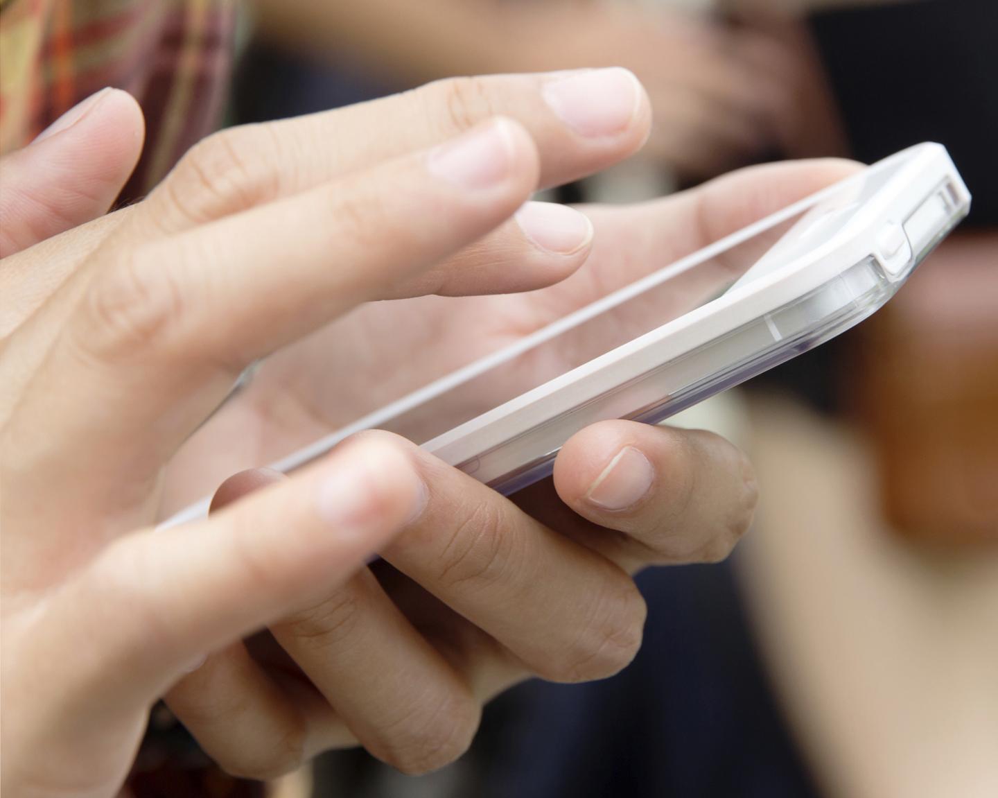 Hand holding a Cell Phone