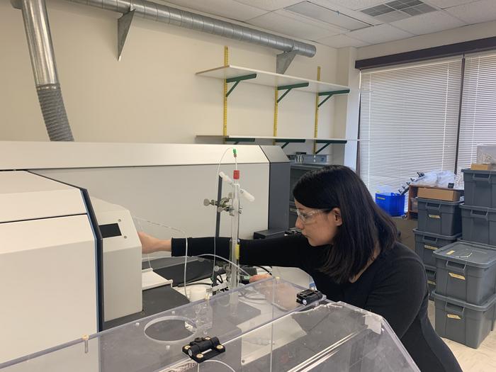 USGS scientist Sarah Janssen analyzes dragonfly larvae samples for mercury