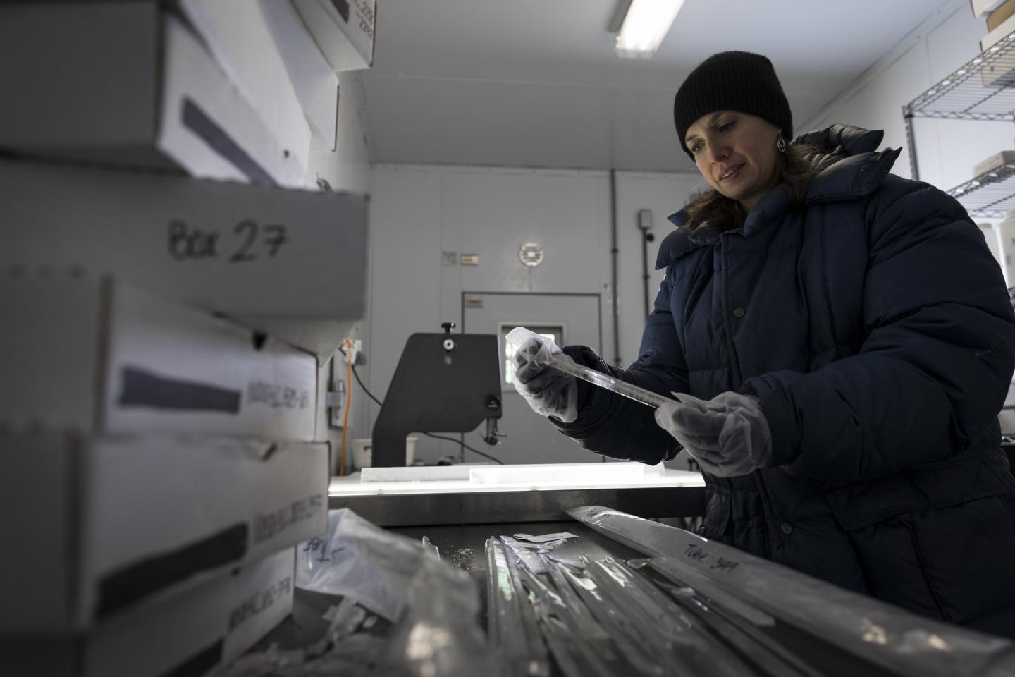 Researcher with Ice Core