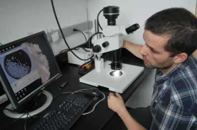Leo Pena With Microscope