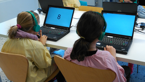 Two schoolgirls conducting cognitive tests in Barcelona