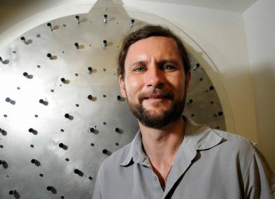 Michael Hart with Prototype of Adaptive Mirror