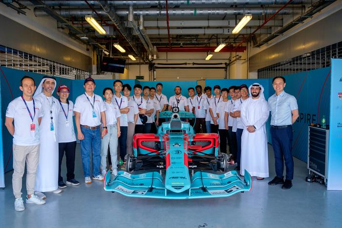 Team Kinetiz, with the Dallara Super Formula SF23 autonomous race car at the Yas Marina F1 Circuit