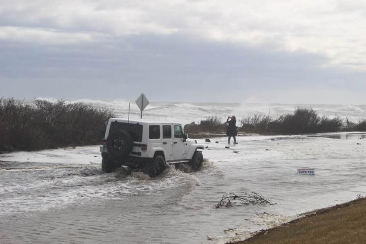 Driver on Flooded Road