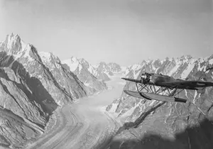The open Heinkel seaplane over the Stauning Alps in East Greenland, 1933.