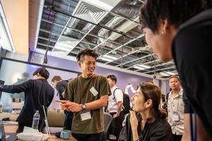 Dr. Shunichi Kasahara regularly interacts with visitors to the Cybernetic Humanity Studio at OIST