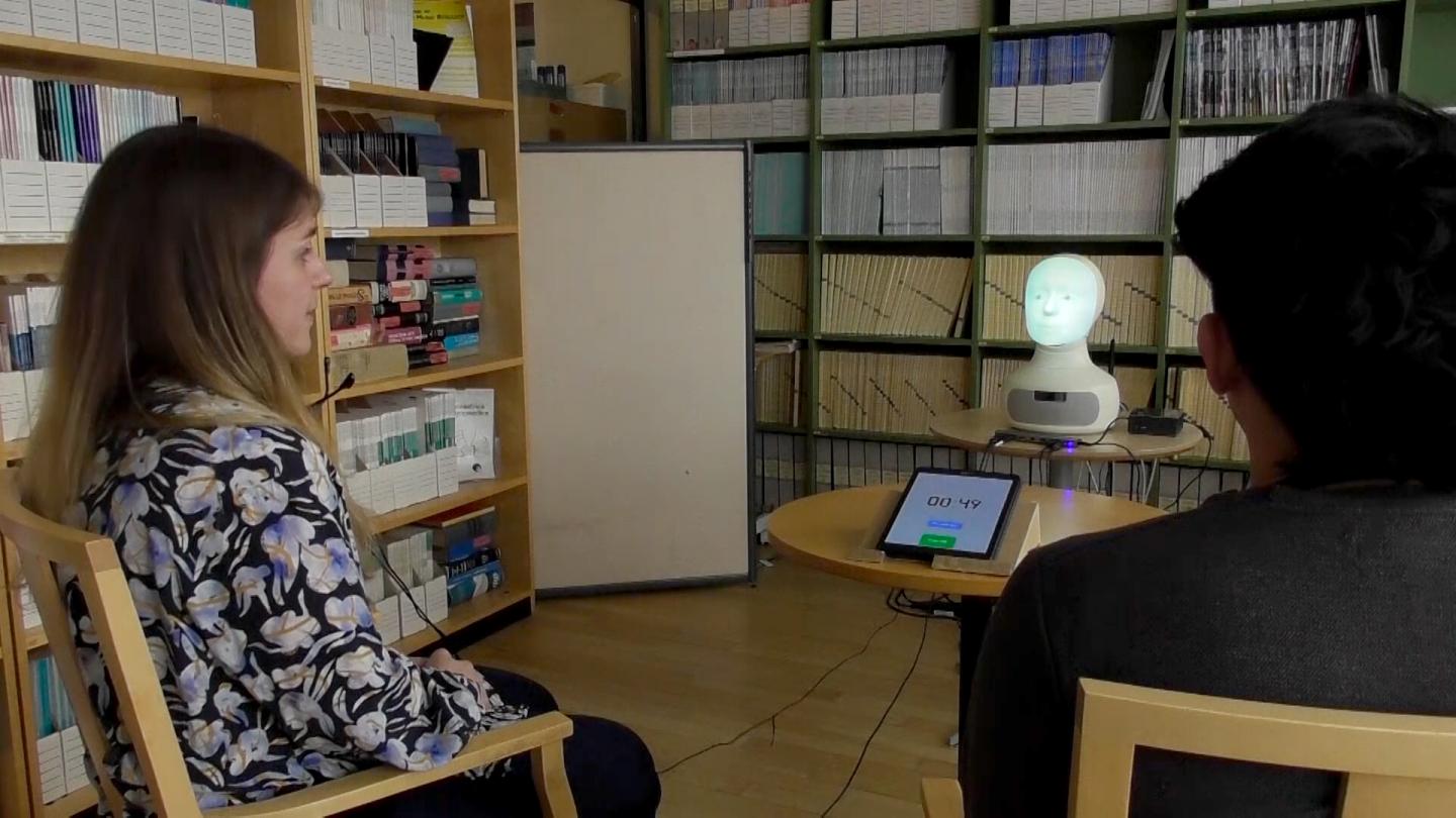 Testing robot interaction in a group activity