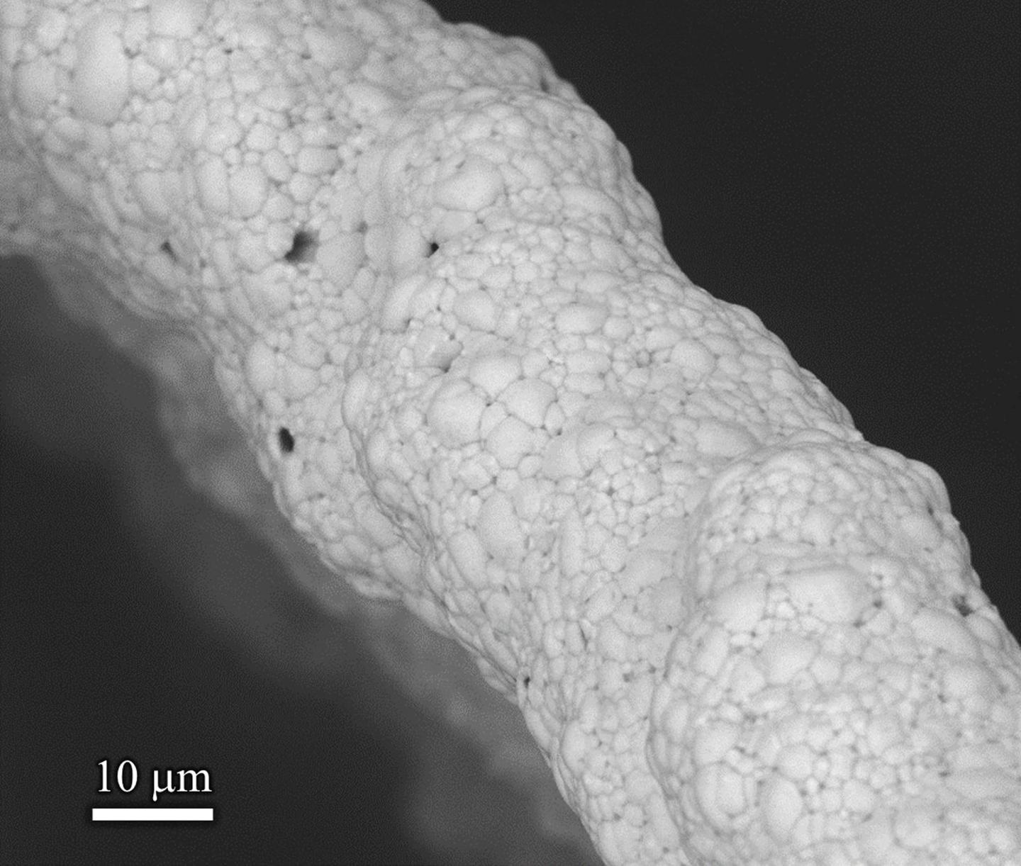 Three-dimensional micro-architected materials and devices using nanoparticle assembly by pointwise spatial printing (6 of 7)