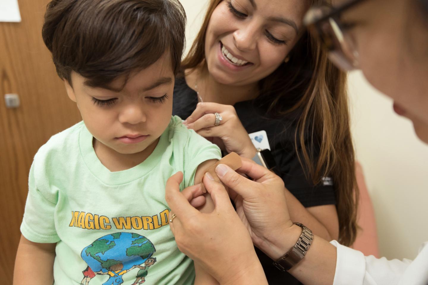 Young boy getting vaccination