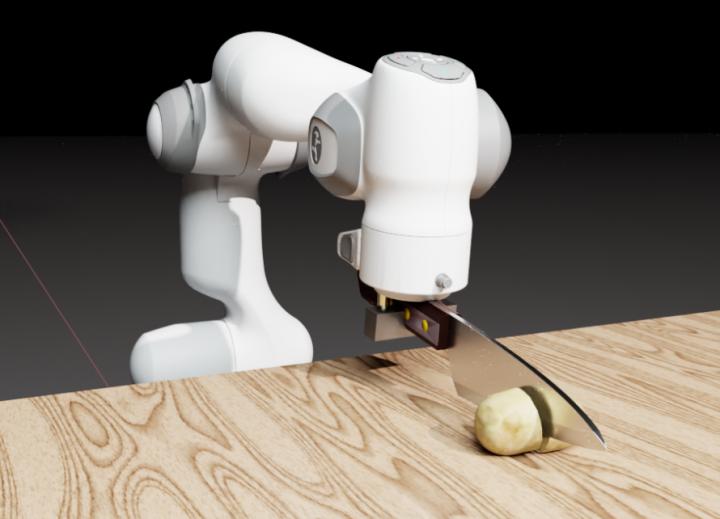 Panda robot cutting potato