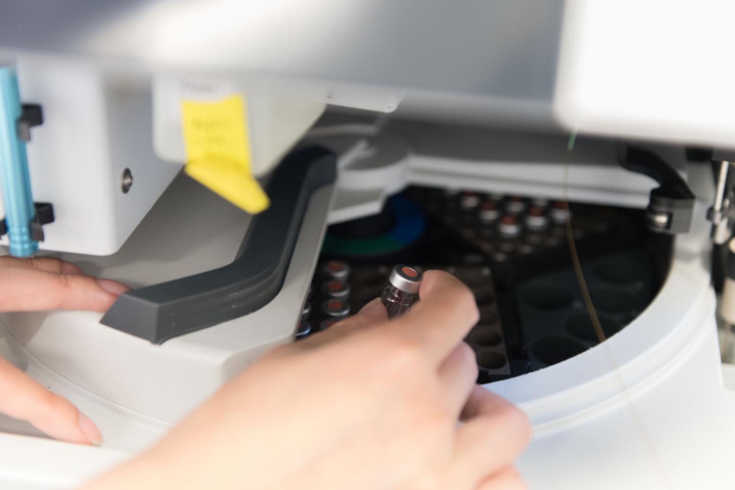 Loading Sample into Mass Spectrometer in Ronghu Wu Lab