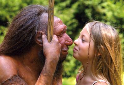 Neanderthal statue and <i>H. sapiens