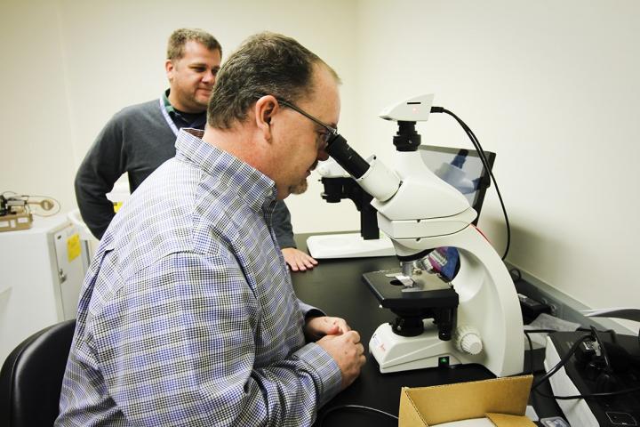 John Walker, Ph.D. and Thomas Burris, Ph.D., Saint Louis University 