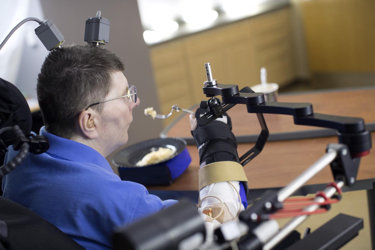 Man with Quadriplegia Employs Injury Bridging Technologies to Move Again -- Just by Thinking