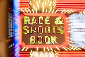 A sign advertising a sportsbook at a Las Vegas casino