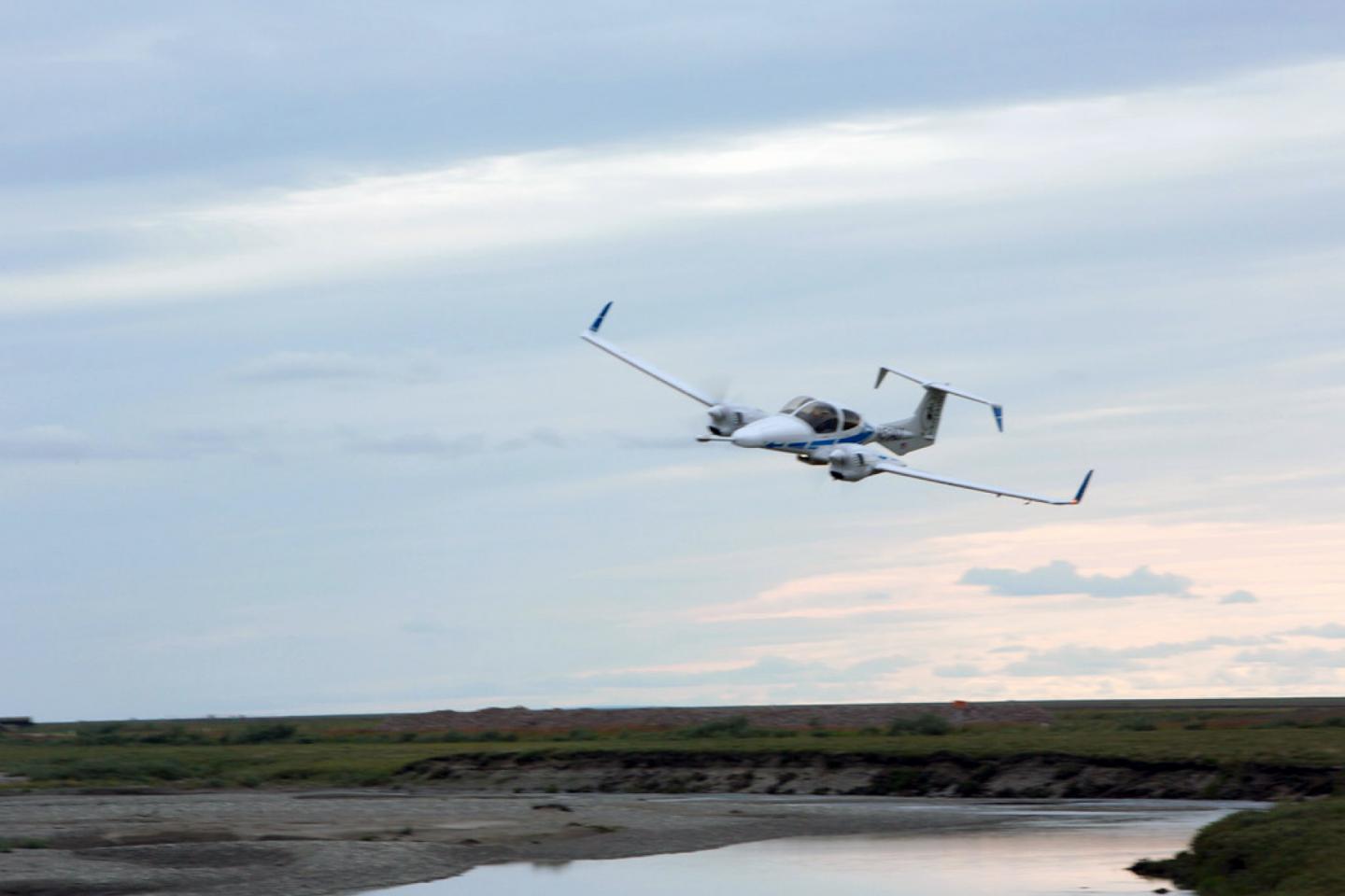 A Plane Flies Low Over the Alaskan Permafrost