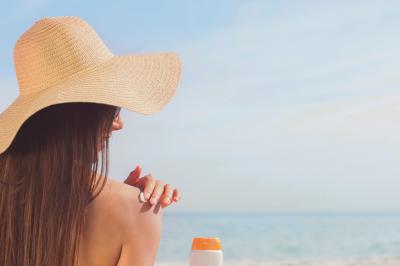 Woman suntanning on the beach