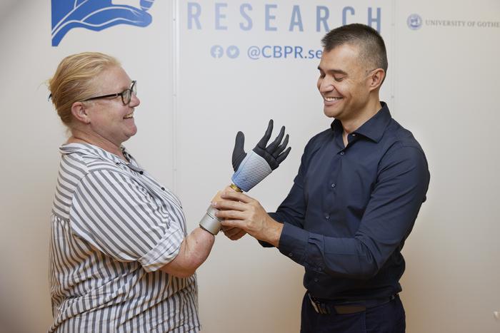 Karin with her integrated bionic hand and Prof. Max Ortiz Catalan