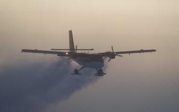A Twin Otter Flies Out of the South Pole