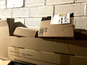 A pile of cardboard boxes from online shopping.