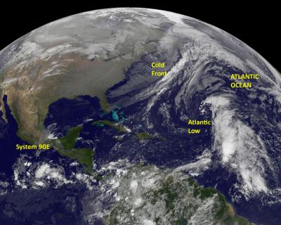 GOES-13 Eyeing 2 Areas for Tropical Development Over Weekend