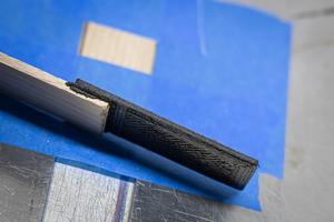 Addjoining uses 3D printing to print a component made of plastic composites onto wood.