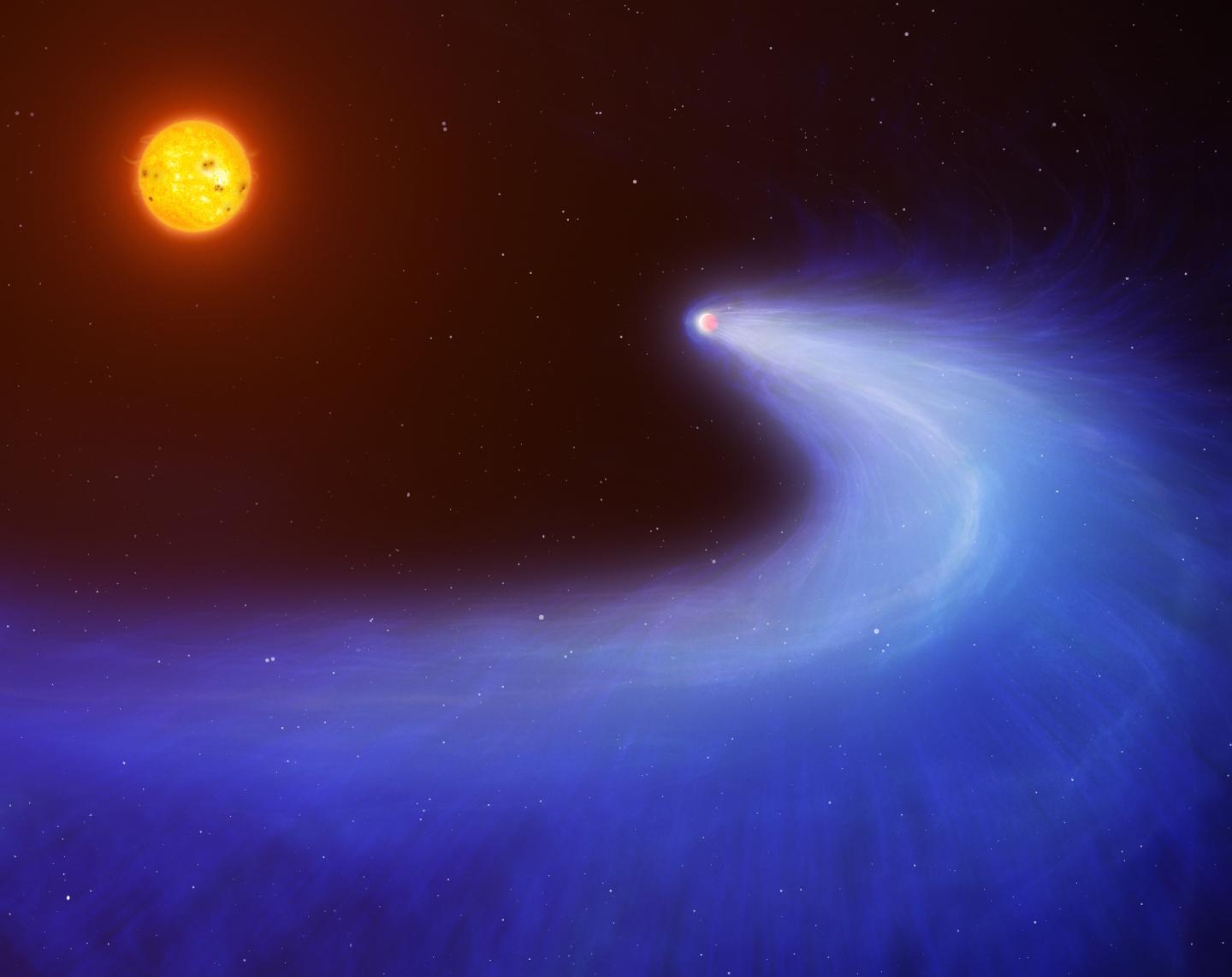Red Dwarf Burns off Planet's Hydrogen Giving It Massive Comet-Like Tail