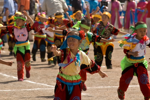 Inner Mongolian children taking part in an Eagle Dance