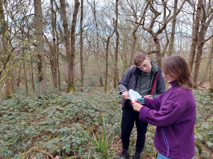 Isla Kendall and Kristian Wade assess woodland condition at Alice Holt Forest