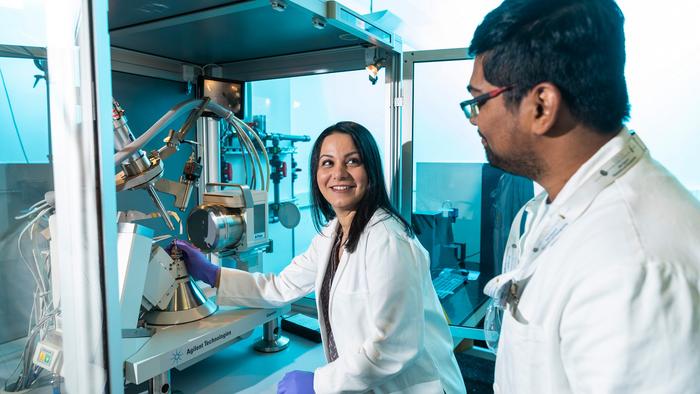 Dr. Shabnam Hematian works with an X-ray diffractometer at UNCG.