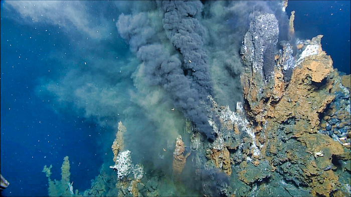 Mineral-laden water emerging from a hydrothermal vent