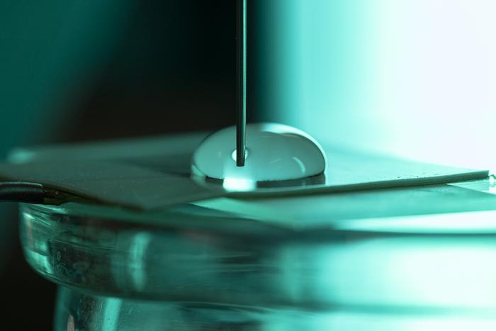 Water movement on Teflon surface makes more electric charge than expected