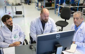 PPPL’s Tullio Barbui, Novimir Pablant and Luis Delgado-Aparicio work on their multi-energy soft X-ray detector (ME-SXR) at DECTRIS, the company that made the device that formed the basis for their detection system.