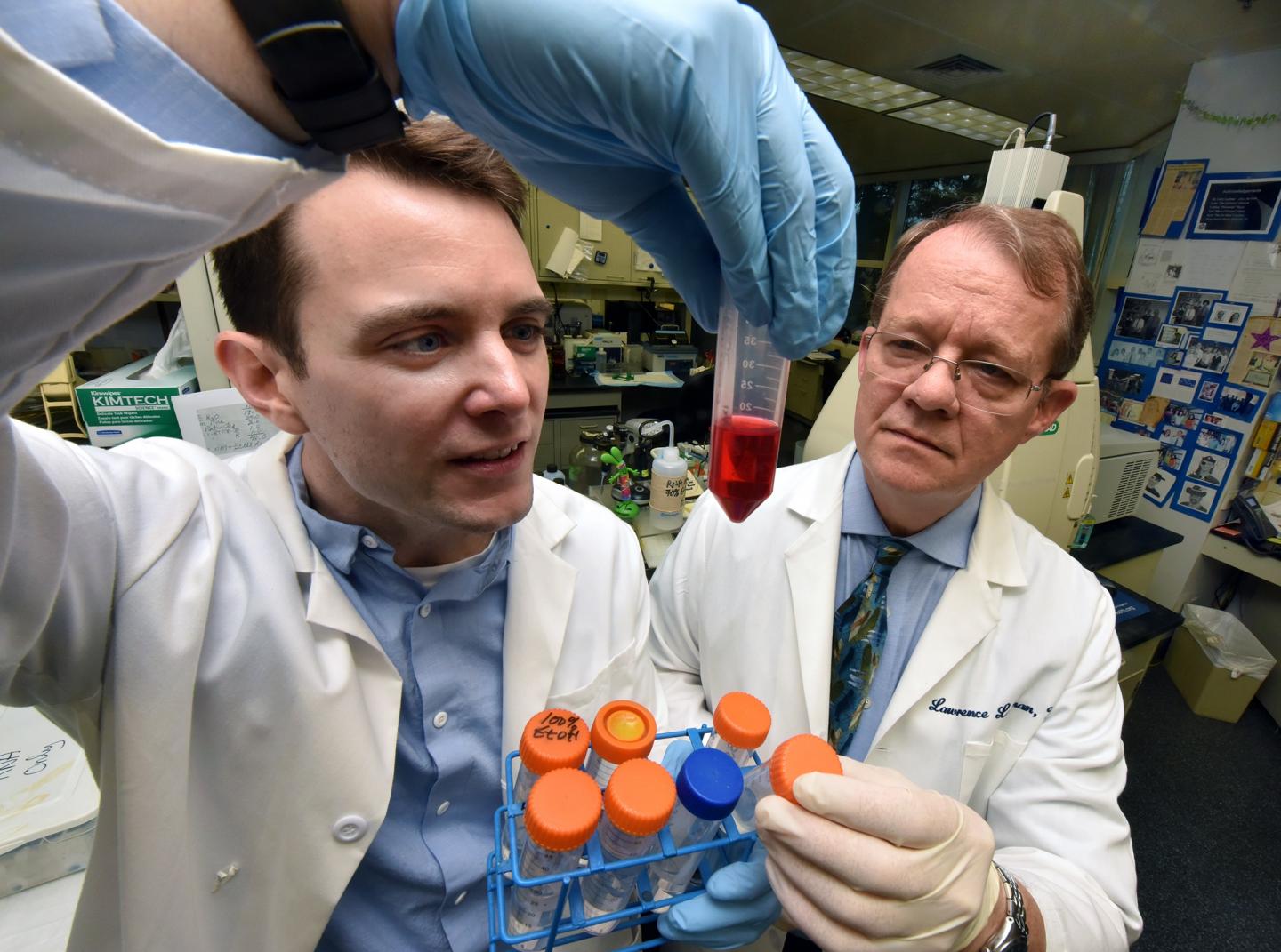 Drs. J. Graham Theisen (left) and Lawrence C. Layman